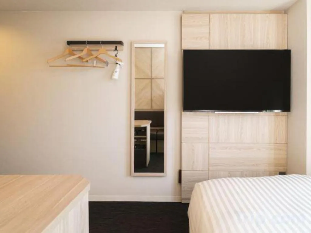 Bed in Super Hotel Satsuma Sendai