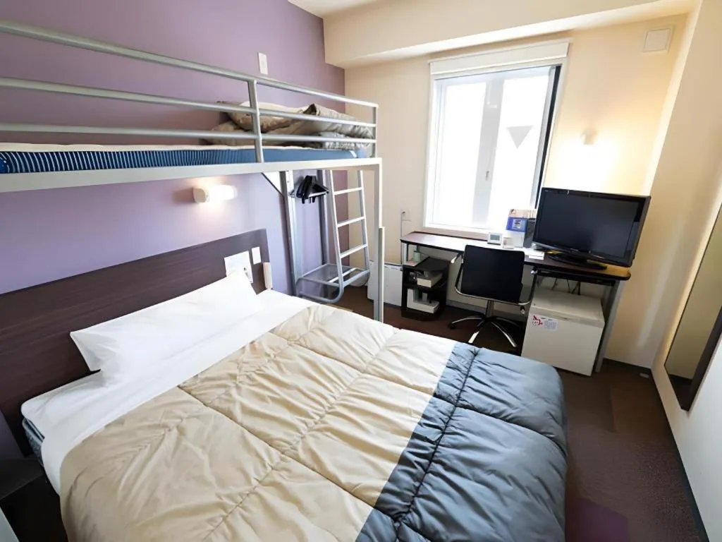 Bed in Super Hotel Satsuma Sendai