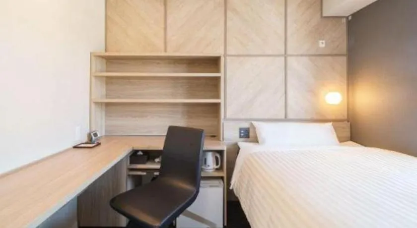 Bed in Super Hotel Satsuma Sendai