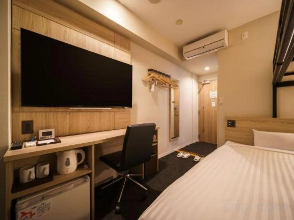 Bed in Super Hotel Satsuma Sendai