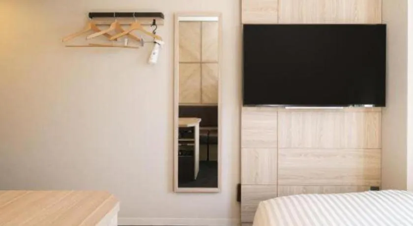 Bed in Super Hotel Satsuma Sendai