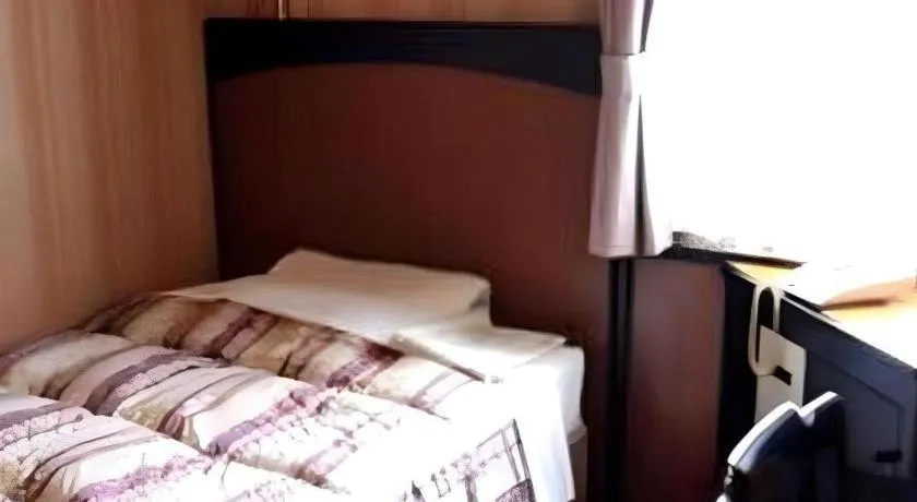 Bed in Hotel Half Time