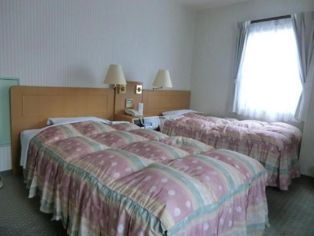 Bed in Hotel Half Time