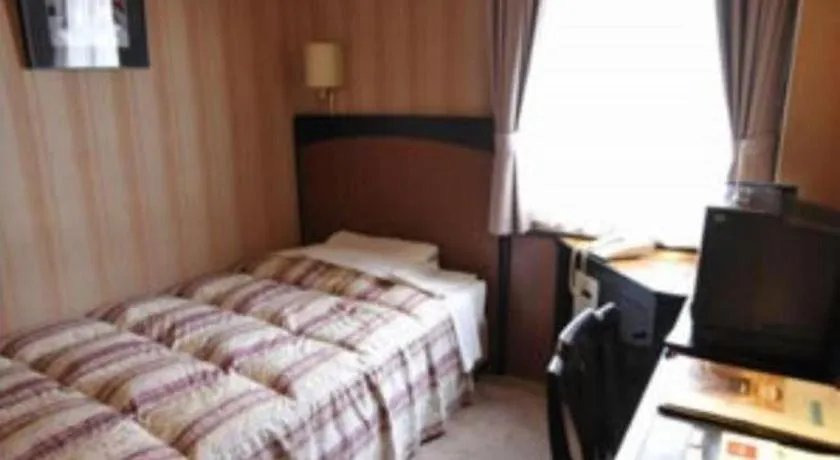 Bed in Hotel Half Time