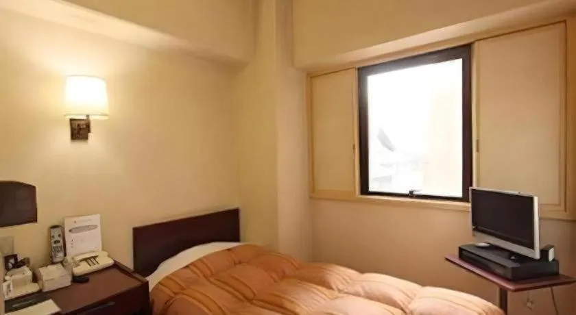 Bed in Ueda Plaza Hotel