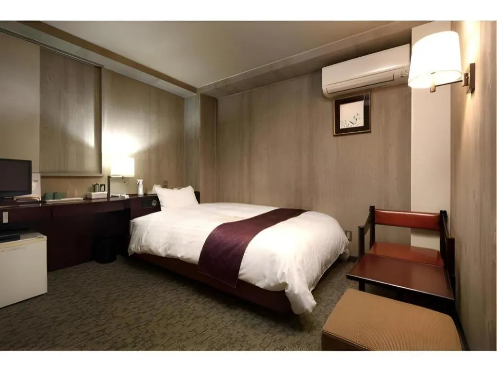 Bed in Ueda Plaza Hotel