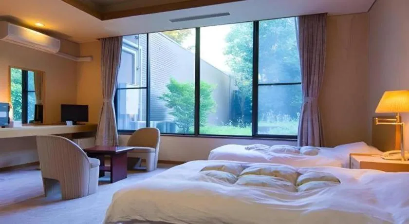 Bed in Yufuin Onsen Yufuin Nanairo no Kaze