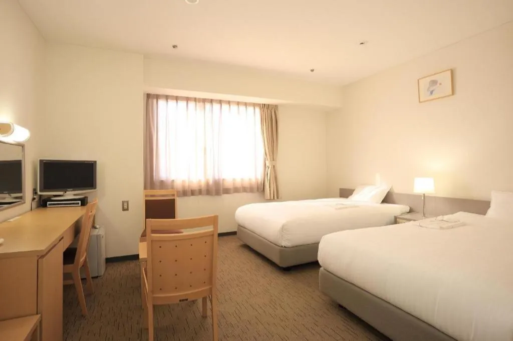 Bed in Smile Hotel Hirosaki