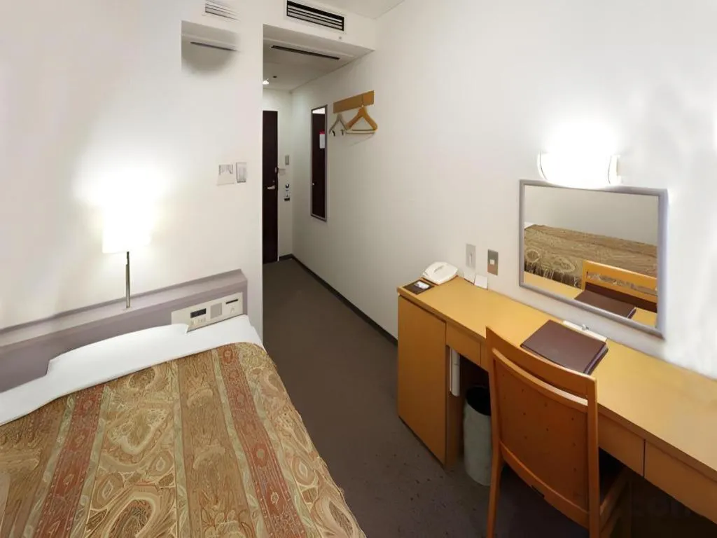 Bed in Smile Hotel Hirosaki