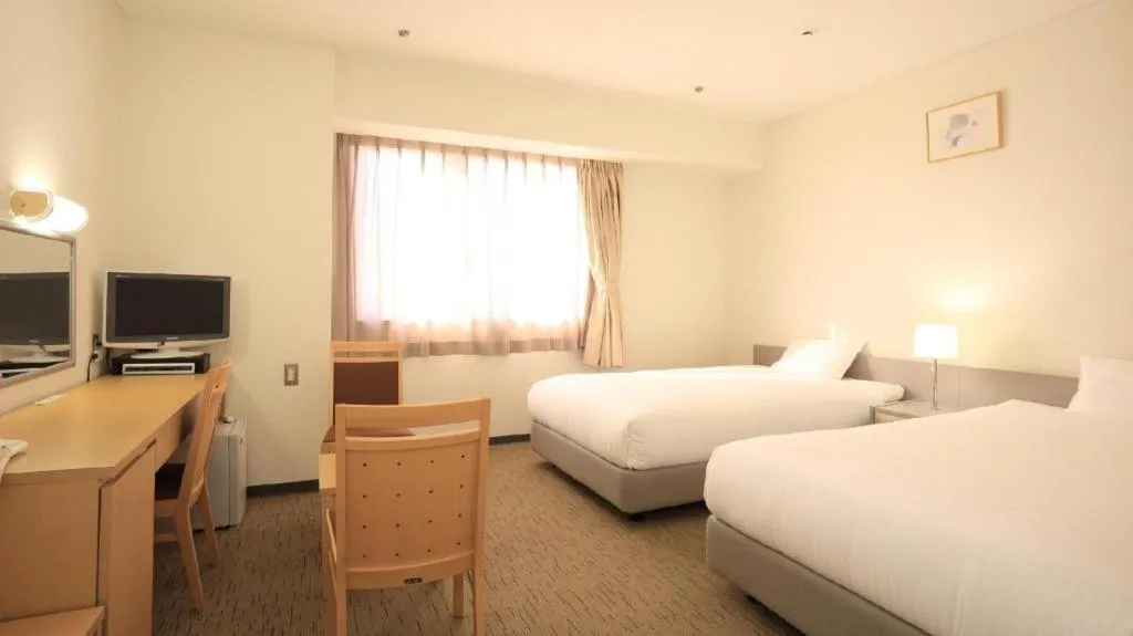 Bed in Smile Hotel Hirosaki