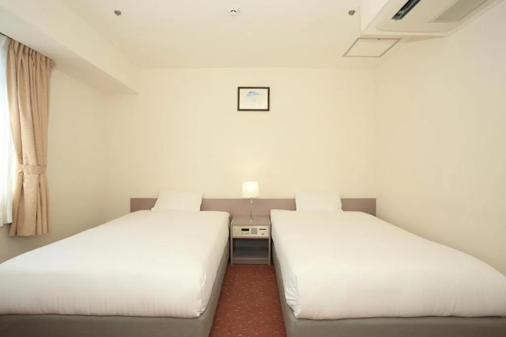 Bed in Smile Hotel Hirosaki