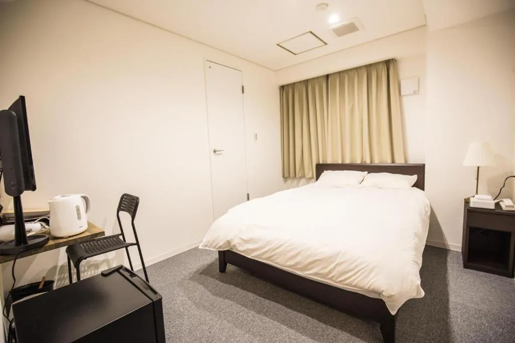Bed in Rozy Hotel Namba