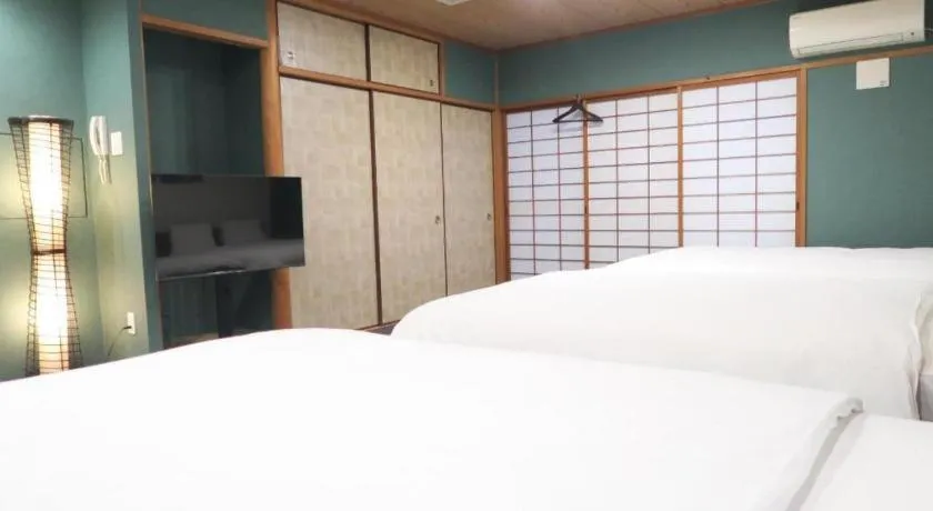 Bed in Rozy Hotel Namba