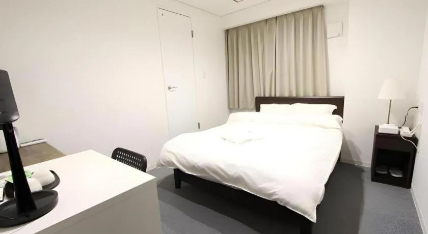 Bed in Rozy Hotel Namba