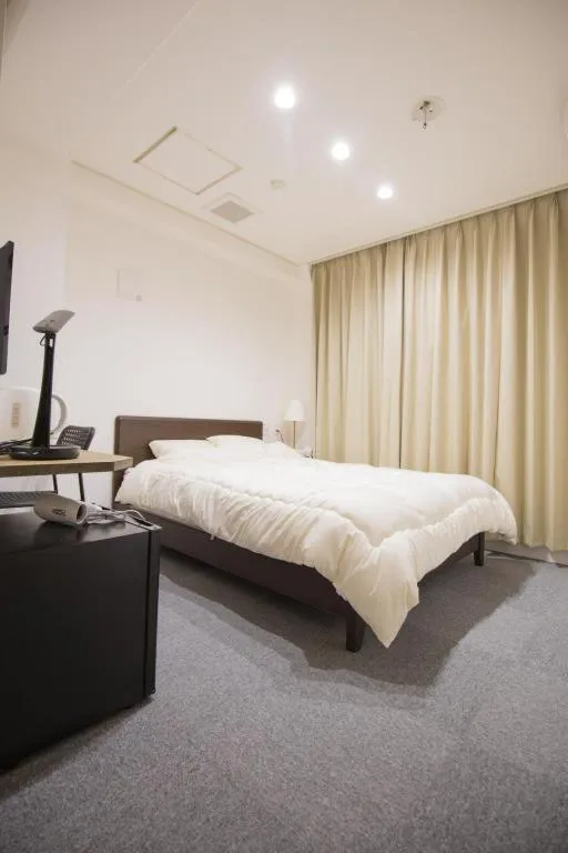 Bed in Rozy Hotel Namba