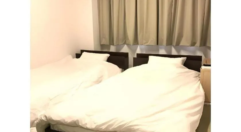 Bed in Rozy Hotel Namba