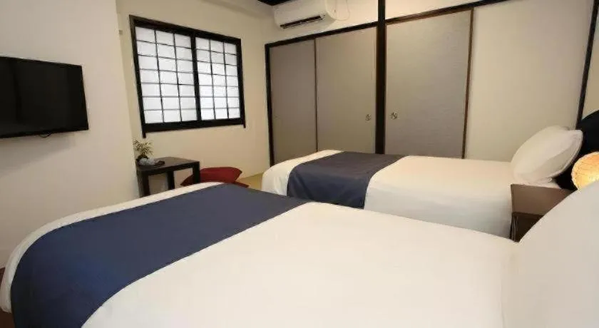 Bed in Rozy Hotel Namba