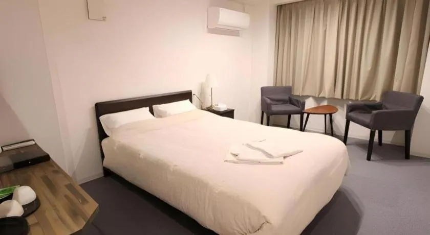 Bed in Rozy Hotel Namba