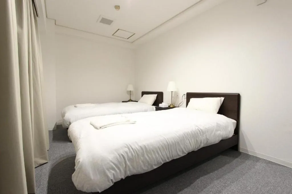 Bed in Rozy Hotel Namba