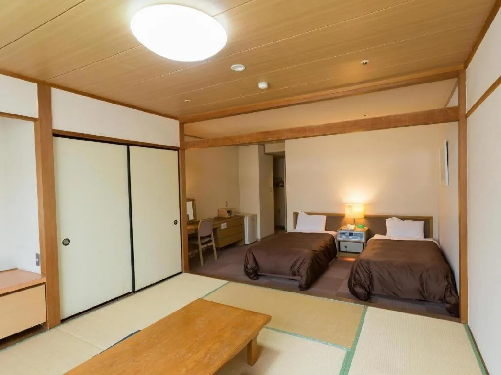 Bed in Washigatake Kogen Hotel Rainbow