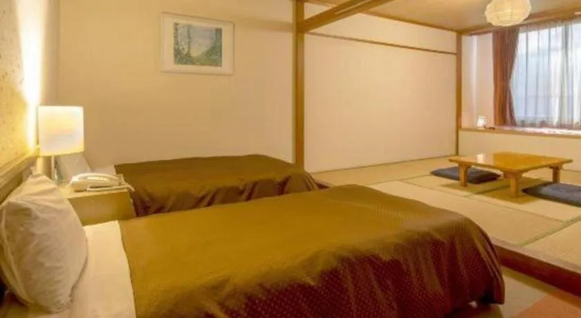 Bed in Washigatake Kogen Hotel Rainbow