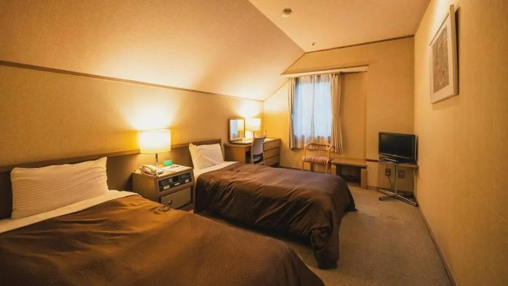 Bed in Washigatake Kogen Hotel Rainbow