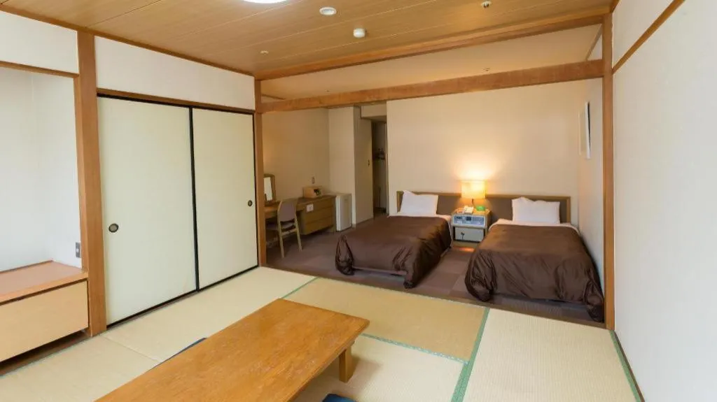 Bed in Washigatake Kogen Hotel Rainbow