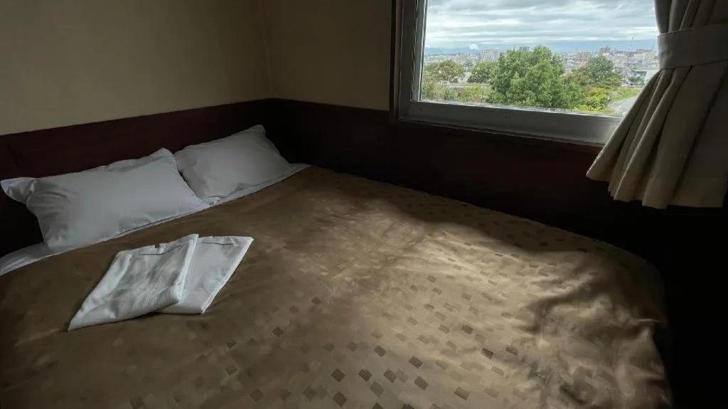 Bed in Fuji Park Hotel