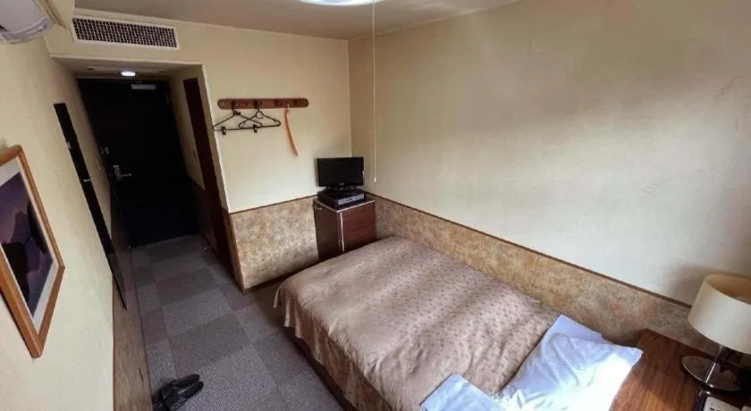 Bed in Fuji Park Hotel