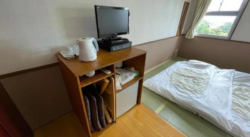 Bed in Fuji Park Hotel