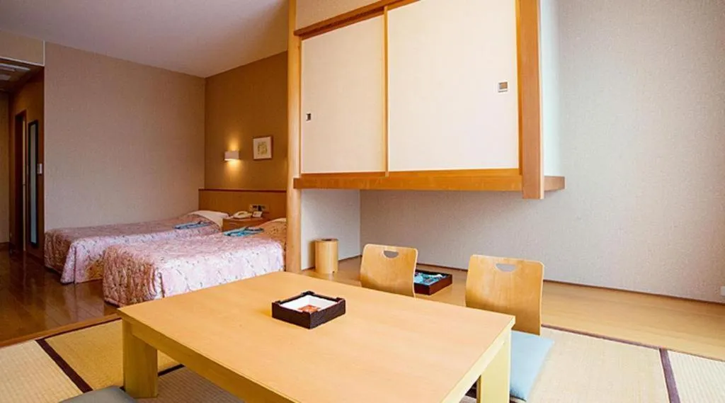 Bed in Sea Side Villa Bokkai