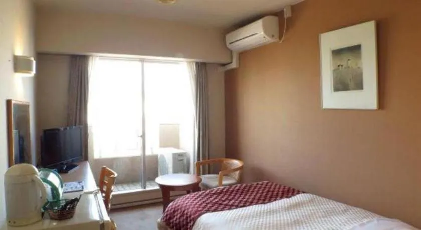 Bed in Hotel Tenchikaku