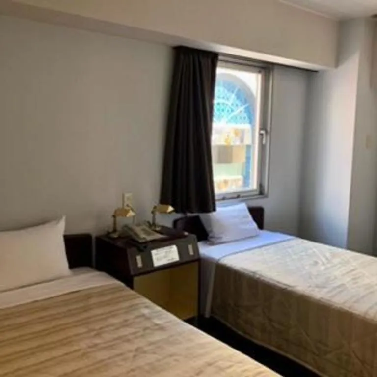 Bed in Shizuoka UI Hotel