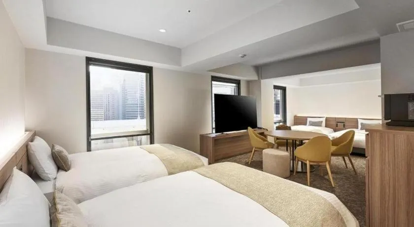Bed in Daiwa Roynet Hotel OSAKA-SHIN UMEDA ANNEX