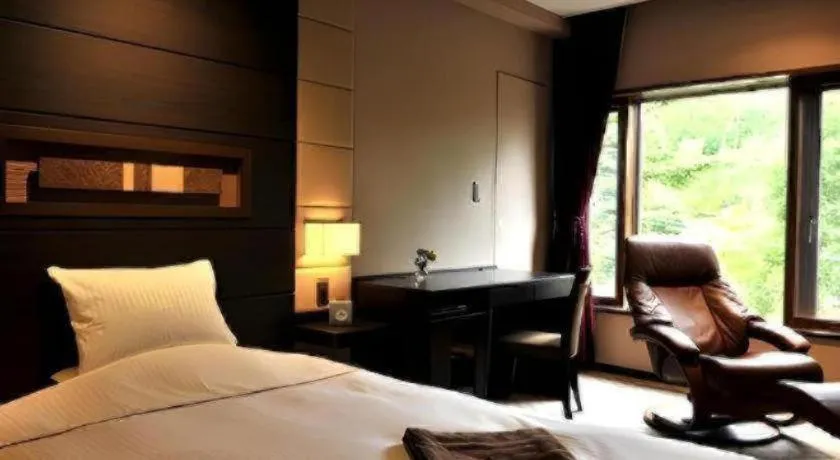 Bed in Akakura Kanko Hotel