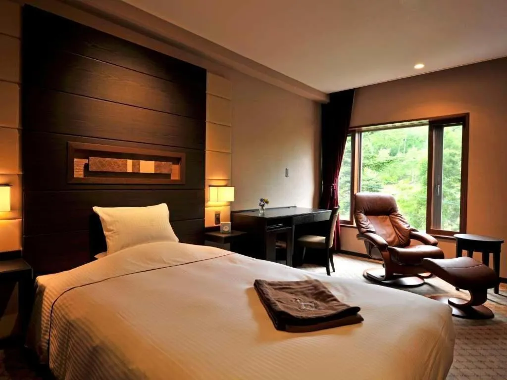 Bed in Akakura Kanko Hotel