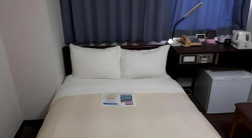 Bed in Hotel Sunshine Iwaki