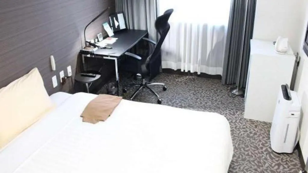 Bed in Hotel Sunshine Iwaki