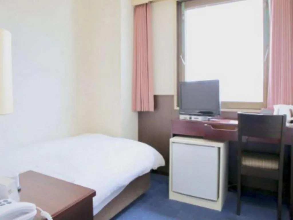 Bed in Hotel Sunshine Iwaki