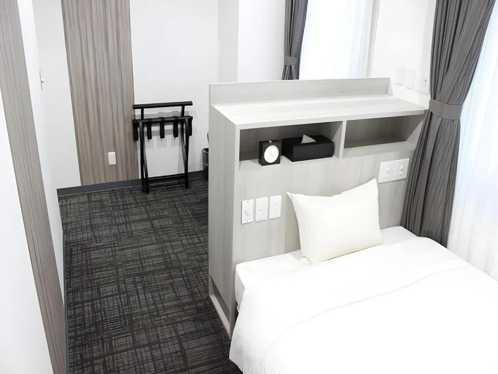 Bed in Hotel Sunshine Iwaki