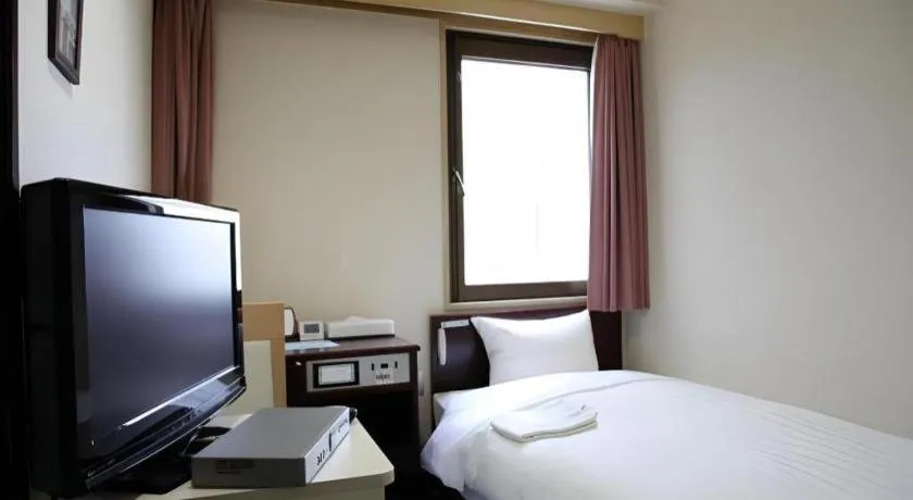 Bed in Hotel Sunshine Iwaki