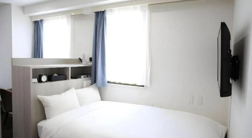 Bed in Hotel Sunshine Iwaki