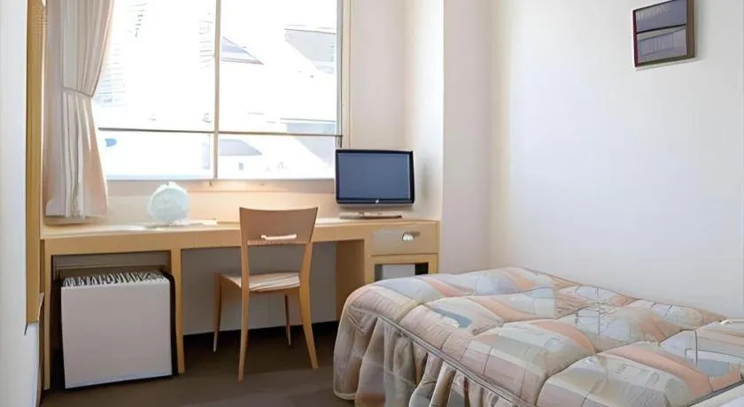 Bed in Hotel Sunshine Iwaki