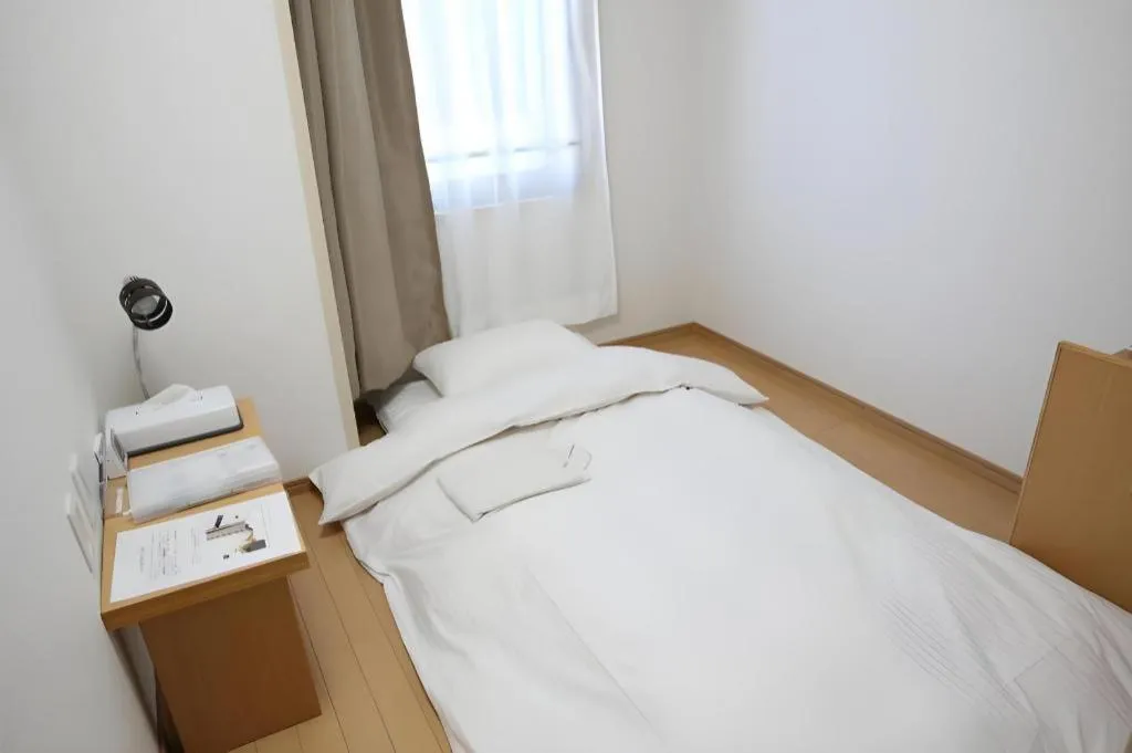 Bed in Hotel Sunshine Iwaki