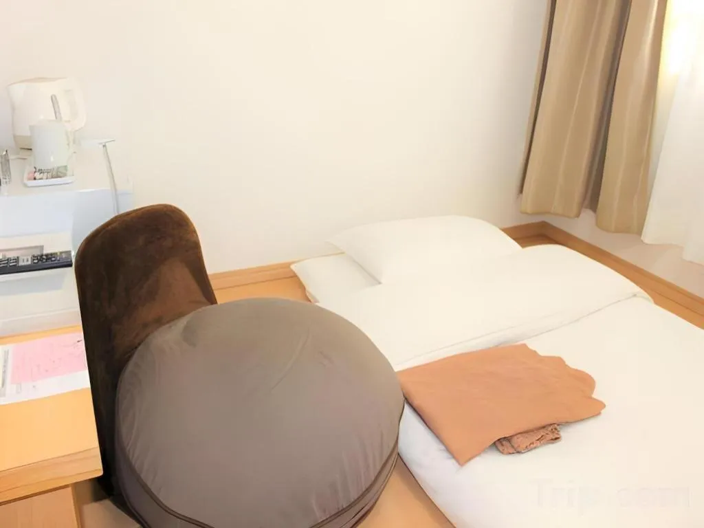 Bed in Hotel Sunshine Iwaki