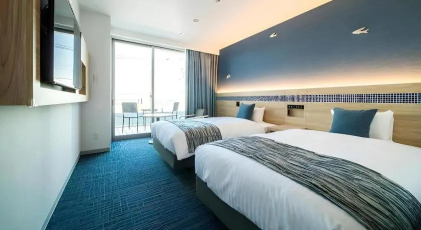 Bed in Goto Tsubaki Hotel