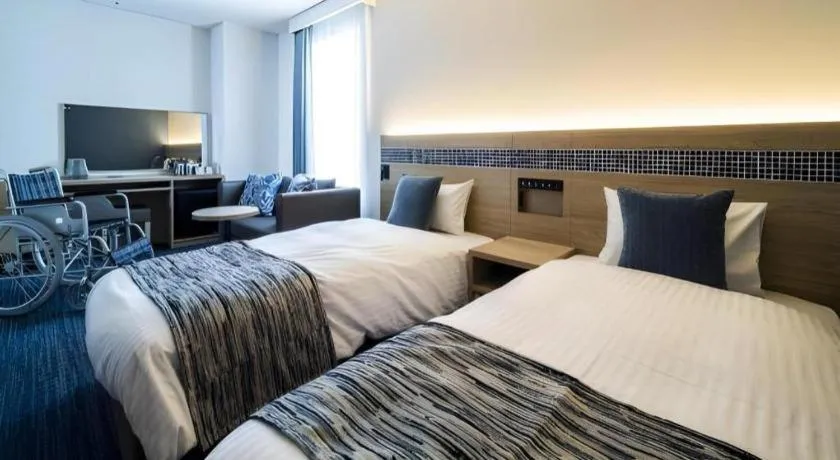 Bed in Goto Tsubaki Hotel