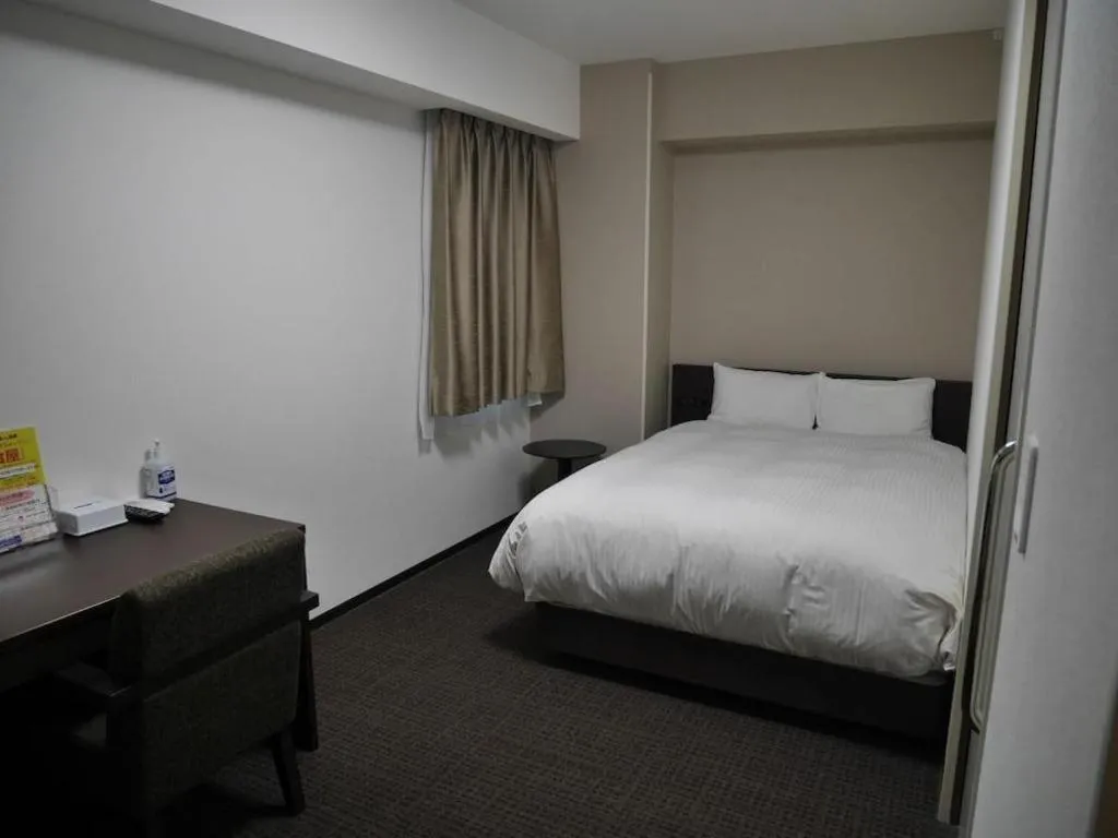 Bed in E Hotel Kumagaya Annex