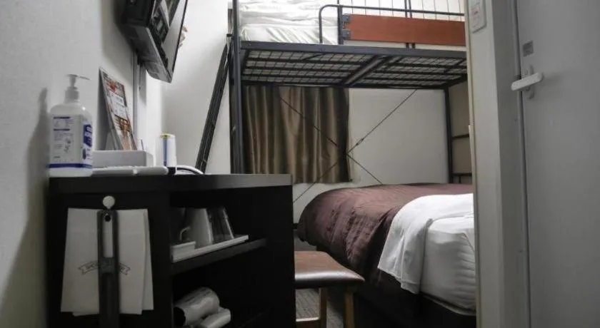 Bed in E Hotel Kumagaya Annex