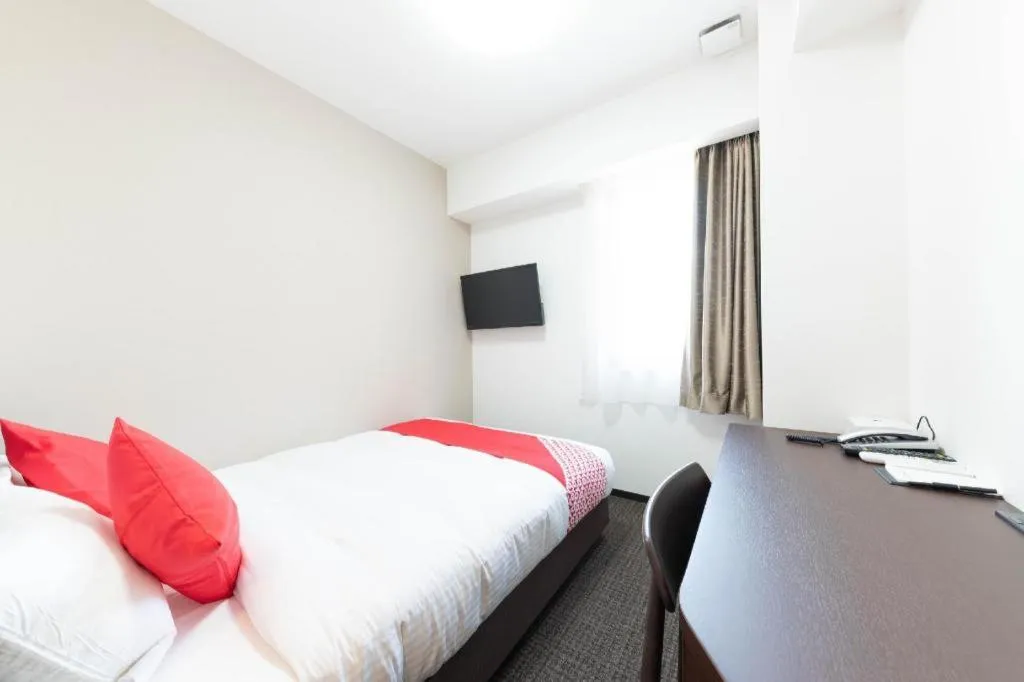 Bed in E Hotel Kumagaya Annex